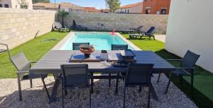 Appartements Appart tout neuf + piscine : photos des chambres