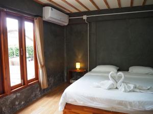 Banmai87 Guest House บ้านไม้87 เกสต์เฮ้าส์