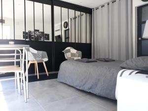 Sejours chez l'habitant L-atelier d-Adrien : photos des chambres