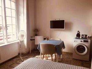 Appartements Studio Le Mansart au pied du Chateau Insead : photos des chambres