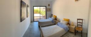 Villas Lone Star Riviera - 5 minutes walk to the beach : photos des chambres