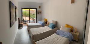 Villas Lone Star Riviera - 5 minutes walk to the beach : photos des chambres