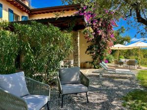 Neu- Villa Ventinove zauberhaft renovierte Landhausvilla mit traumhaftem 180-Seeblick und Park