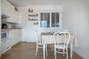 Appartements Escale relaxante avec vue mer : photos des chambres