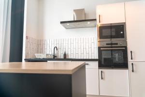 Appartements KASA ARTY - Tout equipe - Agreable et confortable : photos des chambres