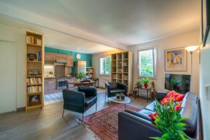 Appartements Les Volets Bleus : photos des chambres