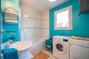 Appartements Les Volets Bleus : photos des chambres