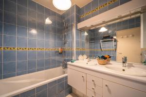 Appartements Les Volets Bleus : photos des chambres