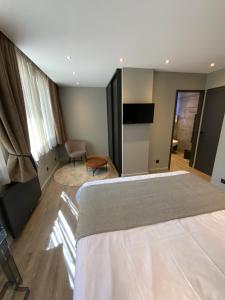 Appartements AU JARDIN DU CLOS : photos des chambres