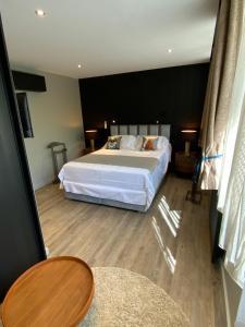 Appartements AU JARDIN DU CLOS : photos des chambres