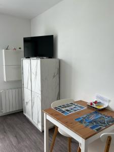 Appartements Le Petit Normand : photos des chambres