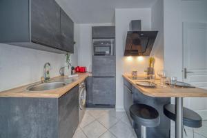 Appartements R-Apparts T2 - Freedom Tranquility : photos des chambres
