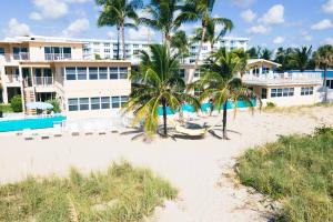 Beachfront-Access to the beach with pool and grill