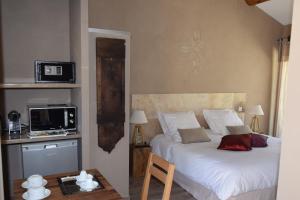 Appartements Chambres La ferme du gros noyer : Chambre Deluxe Double ou Lits Jumeaux