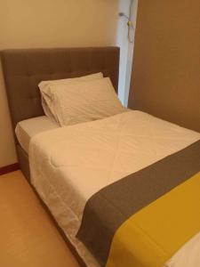 Homey 1Bedroom BGC Condo - MINIMUM 2 Nights stay