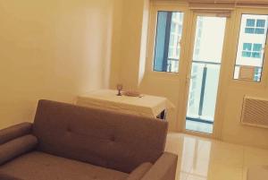 Homey 1Bedroom BGC Condo - MINIMUM 2 Nights stay