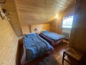 Chalets La joue du loup Bord des pistes - Chalet en bois de charme pour 10 personnes : photos des chambres