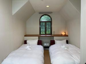 A short walk to Akakura Onsen Ski Lift and Town by Japow House