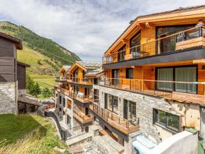 Cocon chaleureux avec Wifi, garage et accès direct aux pistes dans résidence neuve à Val-dIsère - FR-1-694-326