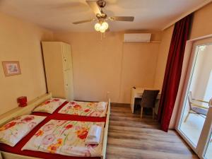 Rooms with a parking space Mali Losinj (Losinj) - 3445