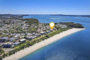 Serenity Now Shoal Bay Beach Front withLinen, WiFi and Air Con