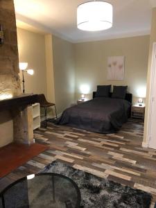 Appartements Escapade cosy au coeur de la cite medievale : photos des chambres