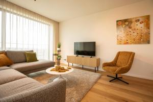 Modern en gezellig appartement vlak aan het strand