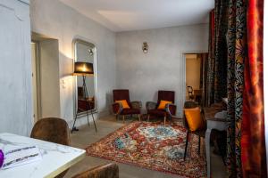 Appart'hotels Le Clos Violette et Le 11 D'Aglae - Appart' hotel Design de Luxe : photos des chambres