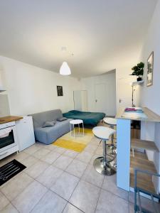 Appartements Superbe studio proche Disney : photos des chambres