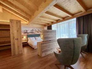 DOLOMITES B&B - Suites, Apartments and SPA - 潘基阿