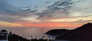 Apartment Tortugas - rooms with AC and great pool at 5 min from Carrizalillo beach and Benito Juarez Bulevard