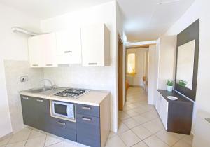 ISA-Residence with swimming pool in Mazzanta at only 600 meters from the beach, apartments with air conditioning and private outdoor area