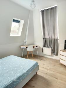 Appartements Cosy Duplex - 2 chambres - WIFI : photos des chambres