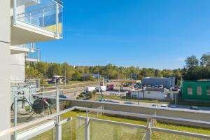 Modern Apartment with Balcony by Noclegi Renters