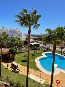 View on golf - swimmingpool - the sea at La Cala