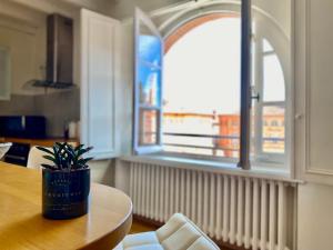 Appartements une pause sur la place Royale : photos des chambres