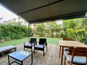 Appartements La Grisette- Jardin terrasse et stationnement ! : photos des chambres