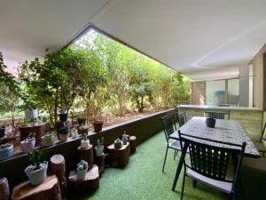 Appartements La Grisette- Jardin terrasse et stationnement ! : photos des chambres