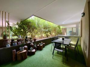 Appartements La Grisette- Jardin terrasse et stationnement ! : photos des chambres