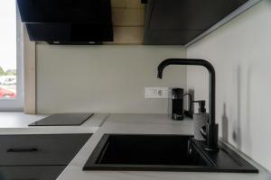 Tiny house aan het water op de appelhof