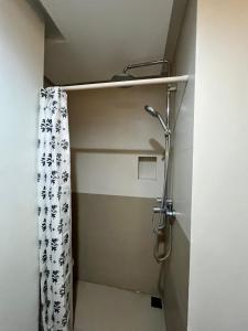 Appleone Ayala Condo with Balcony