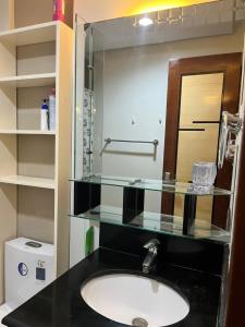 Appleone Ayala Condo with Balcony