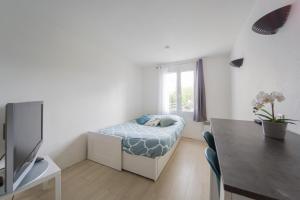 Appartements DISNEY-PARIS - 10 MIN DE DISNEY - 3 MIN GARE : photos des chambres