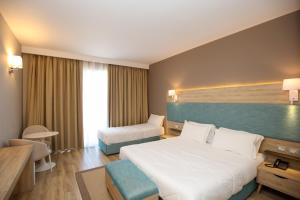 Comfort Triple Room room in Regina Blu