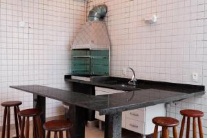 Triplex pé na areia com piscina na cobertura