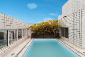 Triplex pé na areia com piscina na cobertura