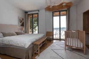 Villas Villa 7 pieces vue imprenable sur le lac : photos des chambres