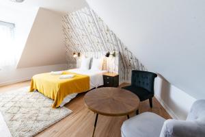Appartements Canopee - Maison chic - Garage - Jardin - Wifi : photos des chambres