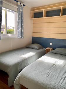 Campings Mobil-home confort face a l-etang : photos des chambres