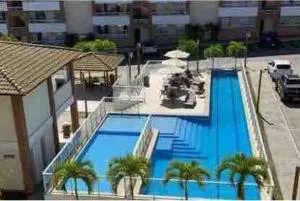 Guarajuba - apartamento 2 quartos com suíte e piscina raia olímpica - مونتي غوردو